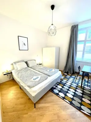 Ein Bett oder Betten in einem Zimmer der Unterkunft Brand New & Spacious Apartment in the City Centre