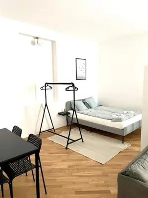 Ein Bett oder Betten in einem Zimmer der Unterkunft Brand New & Spacious Apartment in the City Centre