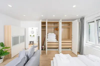 Ein Bett oder Betten in einem Zimmer der Unterkunft Hideaway Favoriten