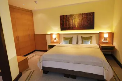 Ein Bett oder Betten in einem Zimmer der Unterkunft Hotel Leobersdorfer Hof