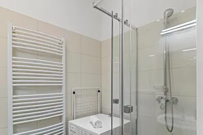 Ein Badezimmer in der Unterkunft Cozy Apartment near City Center