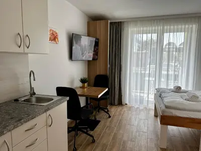 TV/Unterhaltungsangebot in der Unterkunft AJO Apartments - Vetmed - Self-Check-in