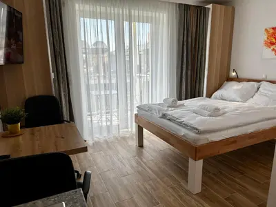 Ein Bett oder Betten in einem Zimmer der Unterkunft AJO Apartments - Vetmed - Self-Check-in