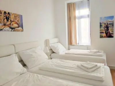 Ein Bett oder Betten in einem Zimmer der Unterkunft Old Vienna Apartments