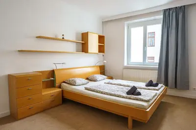 Ein Bett oder Betten in einem Zimmer der Unterkunft Vienna City Apartment Schottentor