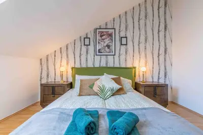 Ein Bett oder Betten in einem Zimmer der Unterkunft Modern Colonial Style, Central, Rooftop, BBQ