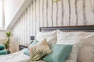 Ein Bett oder Betten in einem Zimmer der Unterkunft Modern Colonial Style, Central, Rooftop, BBQ