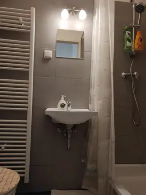 Ein Badezimmer in der Unterkunft CozyNite Premium Apartment Hauptbahnhof 1+2
