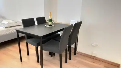 Ein Bett oder Betten in einem Zimmer der Unterkunft CozyNite Premium Apartment Hauptbahnhof 1+2