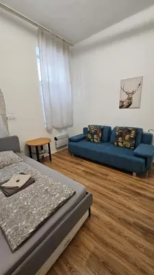Ein Sitzbereich in der Unterkunft CozyNite Premium Apartment Hauptbahnhof 1+2