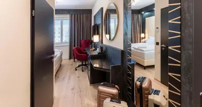 Ein Bett oder Betten in einem Zimmer der Unterkunft PLAZA INN Wiener Neustadt, BW Signature Collection