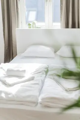 Ein Bett oder Betten in einem Zimmer der Unterkunft Perfekte Wohnung für 4 Personen