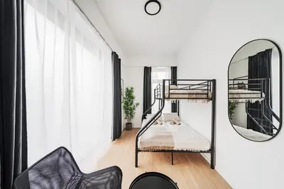 Ein Bett oder Betten in einem Zimmer der Unterkunft Chic Central City Rooms by Home2