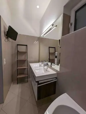 Ein Badezimmer in der Unterkunft Luxury CityApartment 7