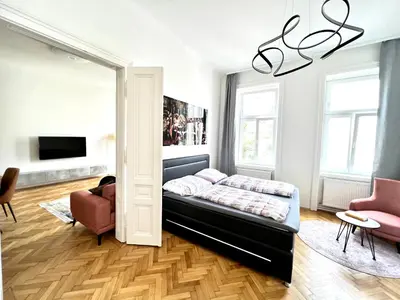 Ein Bett oder Betten in einem Zimmer der Unterkunft Iconic Suite_@O&R