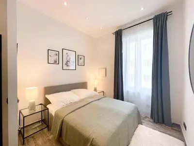 Ein Bett oder Betten in einem Zimmer der Unterkunft Focky City Apartments