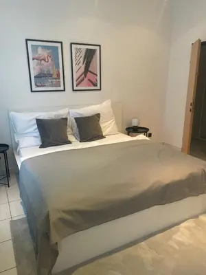 Ein Bett oder Betten in einem Zimmer der Unterkunft Focky City Apartments