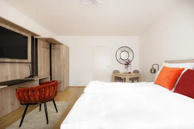 Ein Bett oder Betten in einem Zimmer der Unterkunft NEU! Apartment mit Klimaanlage, nahe Hauptbahnhof