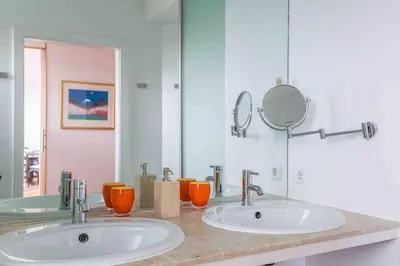 Ein Badezimmer in der Unterkunft Whirlpool , Dachterrasse , Wienblick , zwei Etagen