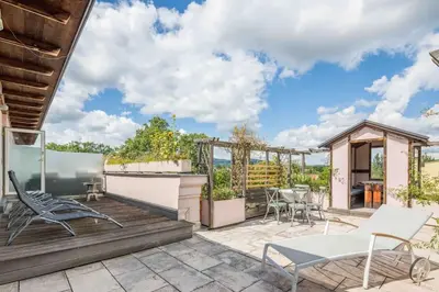 Ein Balkon oder eine Terrasse in der Unterkunft Whirlpool , Dachterrasse , Wienblick , zwei Etagen