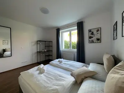 Ein Bett oder Betten in einem Zimmer der Unterkunft FeelHome-GolfClub-Terrasse-6 Gäste-WiFi-Smart TV