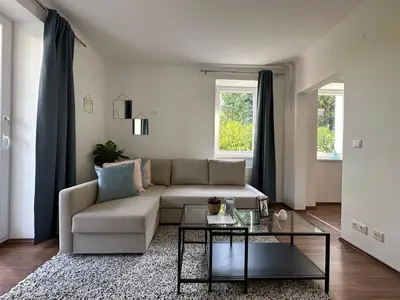 Ein Sitzbereich in der Unterkunft FeelHome-GolfClub-Terrasse-6 Gäste-WiFi-Smart TV