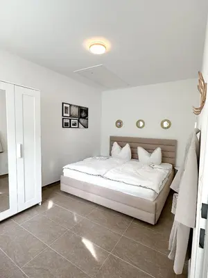 Ein Bett oder Betten in einem Zimmer der Unterkunft Modernes Haus nähe Parndorf