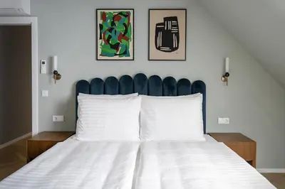 Ein Bett oder Betten in einem Zimmer der Unterkunft Numa Vienna Terra