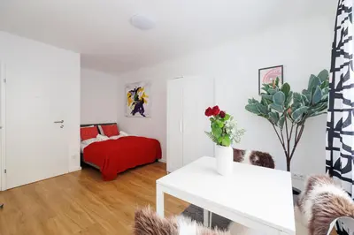 Ein Bett oder Betten in einem Zimmer der Unterkunft Modern City Apartment