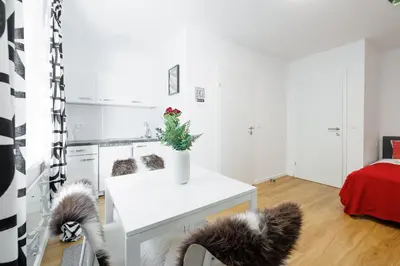 Ein Bett oder Betten in einem Zimmer der Unterkunft Modern City Apartment