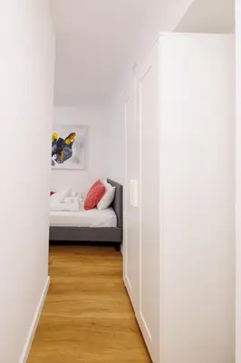 Ein Bett oder Betten in einem Zimmer der Unterkunft Modern City Apartment