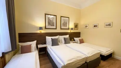 Ein Bett oder Betten in einem Zimmer der Unterkunft City Pension Stephansplatz I Self Check In
