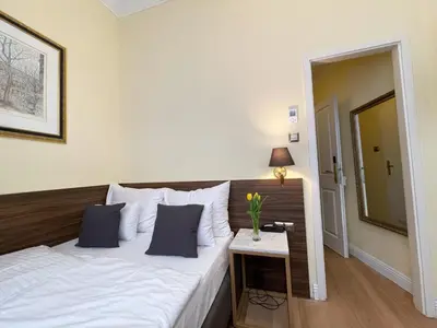 Ein Bett oder Betten in einem Zimmer der Unterkunft City Pension Stephansplatz I Self Check In