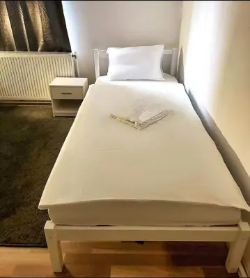 Ein Bett oder Betten in einem Zimmer der Unterkunft Adelin Vienna