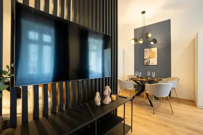 Ein Sitzbereich in der Unterkunft 2-rooms apartment 10 min away from city center