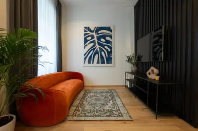 Ein Sitzbereich in der Unterkunft 2-rooms apartment 10 min away from city center