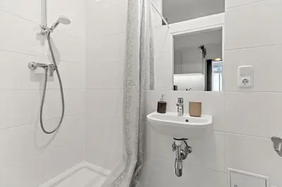 Ein Badezimmer in der Unterkunft Stylish Apartment, 4 min to U3 Zipperer Straße