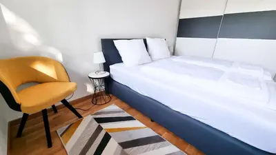 Ein Bett oder Betten in einem Zimmer der Unterkunft Wein Suite
