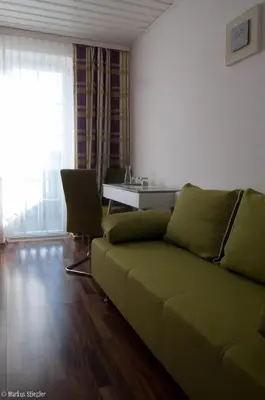 Ein Sitzbereich in der Unterkunft Gästehaus Ringbauer