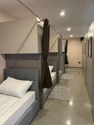 Ein Bett oder Betten in einem Zimmer der Unterkunft New Central Apartments Westbahnhof