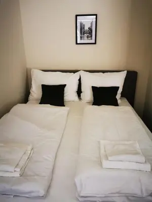 Ein Bett oder Betten in einem Zimmer der Unterkunft Vienna City Apartment Margareten