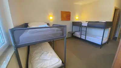 Ein Bett oder Betten in einem Zimmer der Unterkunft Weinland