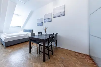 Ein Bett oder Betten in einem Zimmer der Unterkunft ROOFTOP close to Main Station by JR City Apartments
