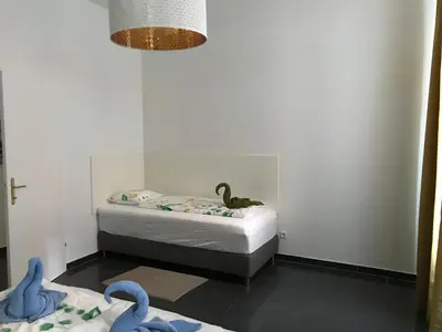Ein Bett oder Betten in einem Zimmer der Unterkunft Apartments near Schönbrunn Palace