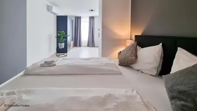Ein Bett oder Betten in einem Zimmer der Unterkunft St. Antoni Suite 3