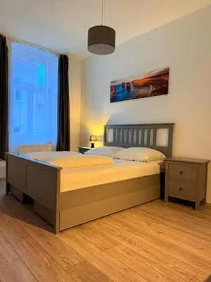 Ein Bett oder Betten in einem Zimmer der Unterkunft Gesamte Unterkunft für 4 Top 18