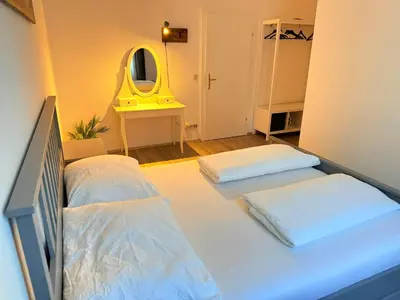 Ein Bett oder Betten in einem Zimmer der Unterkunft Gesamte Unterkunft für 4 Top 18