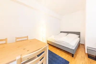 Ein Bett oder Betten in einem Zimmer der Unterkunft CALM & EASY by JR City Apartments