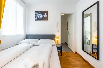 Ein Bett oder Betten in einem Zimmer der Unterkunft CALM & EASY by JR City Apartments