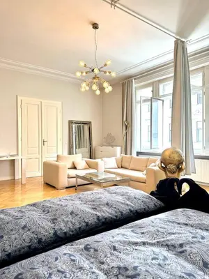 Ein Bett oder Betten in einem Zimmer der Unterkunft Stephansdom apartment